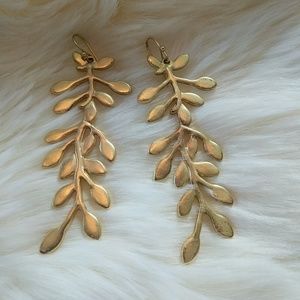 Gold - toned leaf earrings